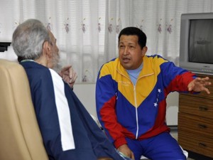 Handout file photo shows Venezuela's President Chavez being visited by Cuba's revolutionary leader Fidel Castro at a hospital in Havana