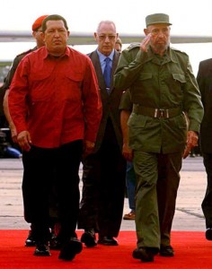 Venezuelan President Hugo Chavez (L) besides his Cuban counterpart Fidel Castro