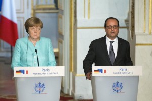 Merkel e Hollande - foto LaPresse