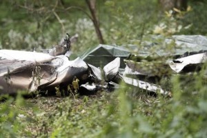 epa05425417 A general view shows debris from a burned Piper PA-32 which crashed on 14 July, in the woods at Predmeja village near Ajdovscina, some 50 kilometers west of Ljubljana, Slovenia, 15 July 2016. According to reports, all four people aboard the plane were killed in the crash, among the victims was Unister founder Thomas Wagner, according to media reports.  EPA/IGOR KUPLJENIK